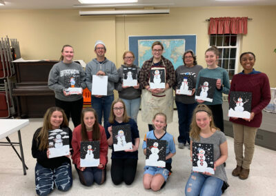 Youth group showing painting projects